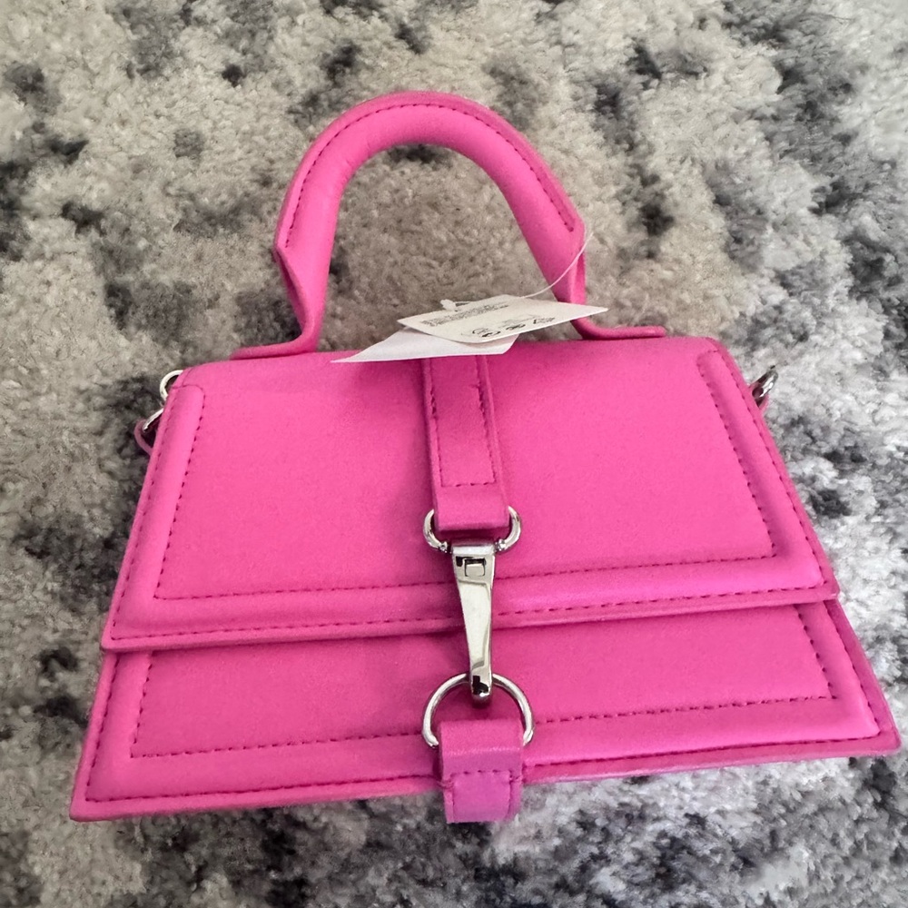 NWT small crossbody bag with hook closure.